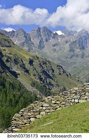 "Stone wall on the Seeweralm alpine pasture, Seewertal, Otztaler Alpen, South Tyrol province, Trentino-Alto Adige, Italy, Europe" View Large Photo Image Stock Image - "Stone wall on the Seeweralm alpine pasture, Seewertal, Otztaler Alpen, South Tyrol province, Trentino-Alto Adige, Italy, Europe". Fotosearch