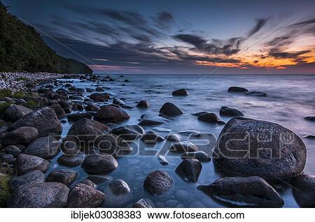 "Stony beach with boulders at sunset, bei Nardewitz, Rugen island, Rugen, Mecklenburg-Western Pomerania, Germany, Europe" View Large Photo Image Stock Image - "Stony beach with boulders at sunset, bei Nardewitz, Rugen island, Rugen, Mecklenburg-Western Pomerania, Germany, Europe". Fotosearch