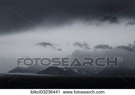"Storm clouds over mountains and glaciers, Isfjorden, Spitsbergen Island, Svalbard Archipelago, Svalbard and Jan Mayen, Norway, Europe" View Large Photo Image Stock Image - "Storm clouds over mountains and glaciers, Isfjorden, Spitsbergen Island, Svalbard Archipelago, Svalbard and Jan Mayen, Norway, Europe". Fotosearch