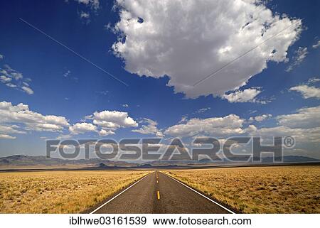 "Straight country road with a vast landscape, Ely, Nevada, United States, North America" View Large Photo Image Stock Photo - "Straight country road with a vast landscape, Ely, Nevada, United States, North America". Fotosearch