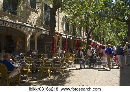 Stock Photo - "Street cafes in the pedestrian zone, Valldemossa, Majorca, Balearic Islands, Spain, Europe". Fotosearch