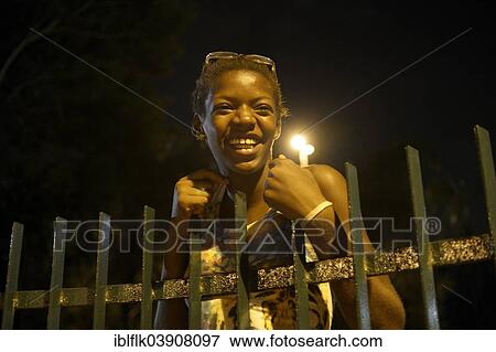 "Street child, adolescent, 15, at night, on the fence of a park in the centre of Rio de Janeiro, Rio de Janeiro State, Brazil, South America" View Large Photo Image Stock Photo - "Street child, adolescent, 15, at night, on the fence of a park in the centre of Rio de Janeiro, Rio de Janeiro State, Brazil, South America". Fotosearch