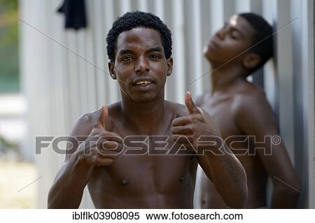 "Street child, youth making a thumbs-up gesture in the centre of Rio de Janeiro, Rio de Janeiro State, Brazil, South America" View Large Photo Image Stock Photography - "Street child, youth making a thumbs-up gesture in the centre of Rio de Janeiro, Rio de Janeiro State, Brazil, South America". Fotosearch