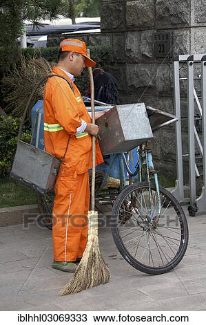 "Street cleaner sleeping while standing, Beijing, China, People's Republic of China, Asia" View Large Photo Image Stock Image - "Street cleaner sleeping while standing, Beijing, China, People's Republic of China, Asia". Fotosearch