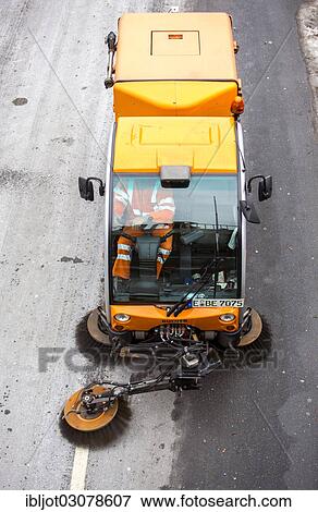 Stock Photo - "Street cleaning, municipal cleaning worker cleaning a street, Essen, North Rhine-Westphalia, Germany, Europe". Fotosearch