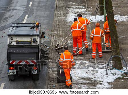 Stock Photography - "Street cleaning, municipal cleaning workers cleaning a street, Essen, North Rhine-Westphalia, Germany, Europe". Fotosearch