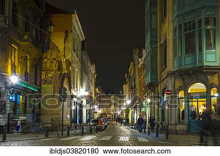 Stock Image - "Street in the historic town centre with restaurants and bars, night scene, Brussels, Belgium, Europe". Fotosearch
