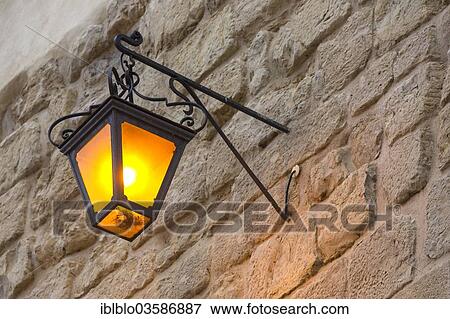 "Street lamp on a stone wall, Coimbra, Centro Region, Portugal, Europe" View Large Photo Image Stock Photo - "Street lamp on a stone wall, Coimbra, Centro Region, Portugal, Europe". Fotosearch