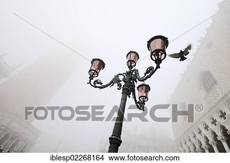 "Street lantern, Doge's Palace, Palazzo Ducale in the fog, Piazzetta San Marco, St. Mark's Square, Venice, Venezia, Veneto, Italy, Europe" View Large Photo Image Picture - "Street lantern, Doge's Palace, Palazzo Ducale in the fog, Piazzetta San Marco, St. Mark's Square, Venice, Venezia, Veneto, Italy, Europe". Fotosearch