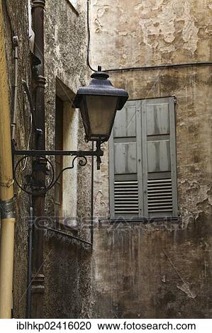 Stock Image - Street lantern, historic town centre, Grasse, Cote d'Azur or French Riviera, France, Europe. Fotosearch