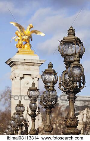 Picture - "Street lights on Pont Alexandre bridge, Paris, Ile-de-France, France, Europe". Fotosearch