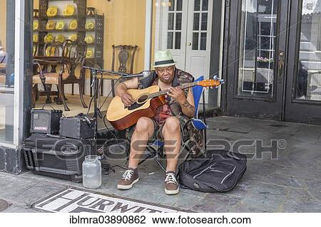 "Street musician, elderly man playing the guitar, blues music being performed on Bourbon Street, New Orleans, Louisiana, United States, North America" View Large Photo Image Stock Image - "Street musician, elderly man playing the guitar, blues music being performed on Bourbon Street, New Orleans, Louisiana, United States, North America". Fotosearch