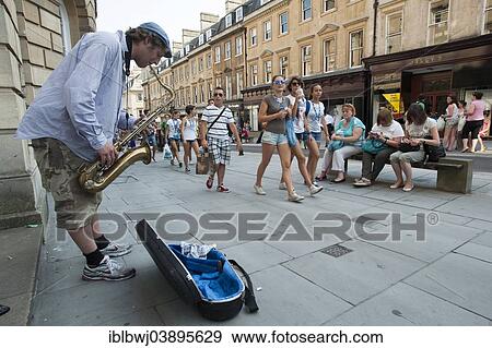 Stock Photo - "Street musician playing the saxophone, Bath, Somerset, South England, England, United Kingdom, Europe". Fotosearch