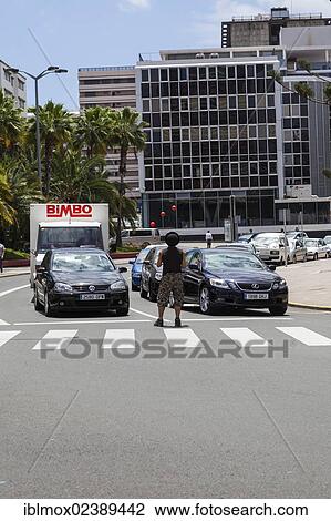 "Street performer juggling on an intersection to collect money from motorists, Las Palmas, Gran Canaria, Canary Islands, Spain, Europe, PublicGround, Europe" View Large Photo Image Stock Image - "Street performer juggling on an intersection to collect money from motorists, Las Palmas, Gran Canaria, Canary Islands, Spain, Europe, PublicGround, Europe". Fotosearch