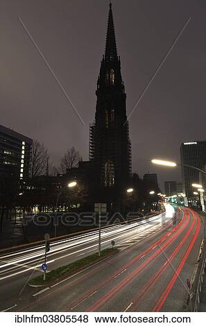"Street scene with light trails and the silhouette of the St. Nicholas' Church, Willy-Brandt-Str., Hamburg, Germany, Europe" View Large Photo Image Stock Photo - "Street scene with light trails and the silhouette of the St. Nicholas' Church, Willy-Brandt-Str., Hamburg, Germany, Europe". Fotosearch