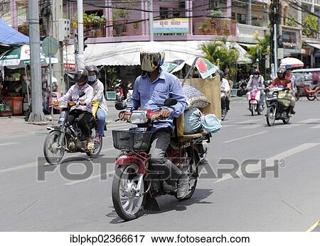 "Street scene with motor scooters, Phnom Penh, Cambodia, Southeast Asia, Asia" View Large Photo Image Stock Photo - "Street scene with motor scooters, Phnom Penh, Cambodia, Southeast Asia, Asia". Fotosearch