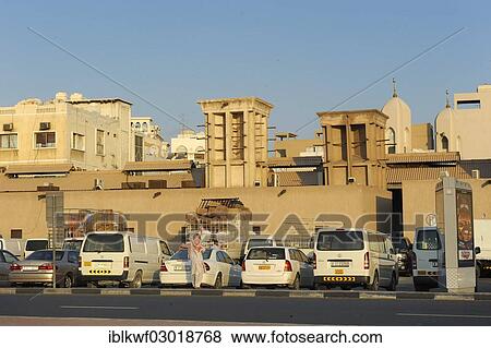 "Street scene with wind towers or Badgir, Daira, Dubai, Emirate of Dubai, United Arab Emirates, Asia" View Large Photo Image Stock Photo - "Street scene with wind towers or Badgir, Daira, Dubai, Emirate of Dubai, United Arab Emirates, Asia". Fotosearch