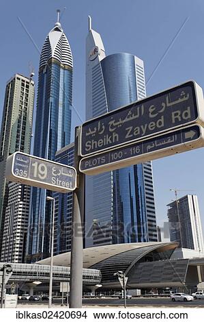 Street sign for Sheikh Zayed Road in front of skyscrapers, Dubai International Financial Centre, DIFC, Dubai, United Arab Emirates, Middle East, Asia View Large Photo Image Picture - Street sign for Sheikh Zayed Road in front of skyscrapers, Dubai International Financial Centre, DIFC, Dubai, United Arab Emirates, Middle East, Asia. Fotosearch