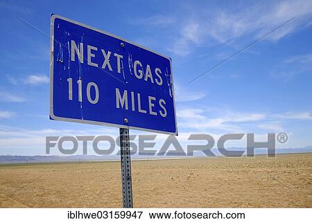 "Street sign, """"Next Gas 110 Miles"""" on Nevada State Route 375, Rachel, Rachel, Nevada, United States, North America" View Large Photo Image Stock Photo - "Street sign, """"Next Gas 110 Miles"""" on Nevada State Route 375, Rachel, Rachel, Nevada, United States, North America". Fotosearch