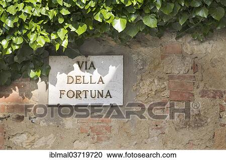 Stock Image - "Street sign """"Via della Fortuna"""", Pienza, Val d'Orcia region, Province of Siena, Tuscany, Italy, Europe". Fotosearch