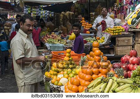 "Street vendor arranging oranges for sale at a fruit stall, Allahabad, Uttar Pradesh, India, Asia" View Large Photo Image Stock Photo - "Street vendor arranging oranges for sale at a fruit stall, Allahabad, Uttar Pradesh, India, Asia". Fotosearch