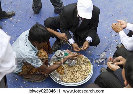 "Street vendor selling peanuts at a demonstration against the ruling Awami League, Dhaka, Bangladesh, South Asia, Asia" View Large Photo Image Stock Image - "Street vendor selling peanuts at a demonstration against the ruling Awami League, Dhaka, Bangladesh, South Asia, Asia". Fotosearch