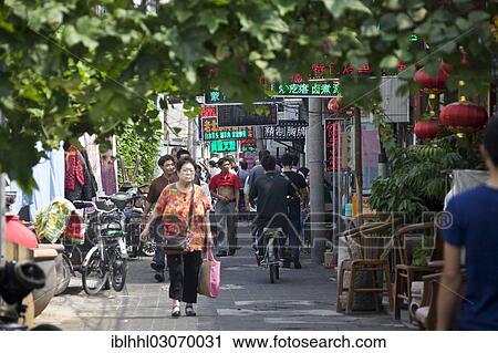 Stock Image - "Street with foliage, Qianmen Strasse, Beijing, China, People's Republic of China, Asia". Fotosearch