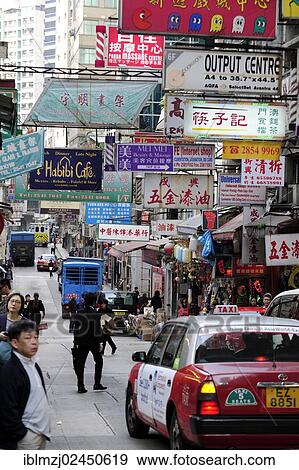 "Street with many advertising signs and signboards in Chung Wan, Central District, Hong Kong Island, Hong Kong, China, Asia" View Large Photo Image Stock Photo - "Street with many advertising signs and signboards in Chung Wan, Central District, Hong Kong Island, Hong Kong, China, Asia". Fotosearch