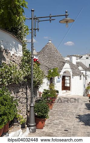 "Street with Trullo houses, Trulli Distrikt, Alberobello, Apulia, Italy, Europe" View Large Photo Image Stock Photo - "Street with Trullo houses, Trulli Distrikt, Alberobello, Apulia, Italy, Europe". Fotosearch