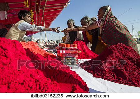 Stock Photography - "Streetvendor selling red dye powder for religious use during Kumbha Mela, Allahabad, Uttar Pradesh, India, Asia". Fotosearch