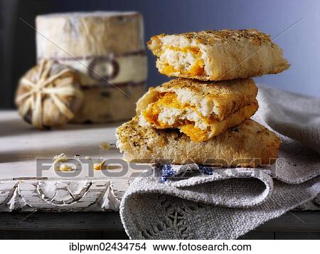 Picture - Stromboli bread filled with cheese. Fotosearch