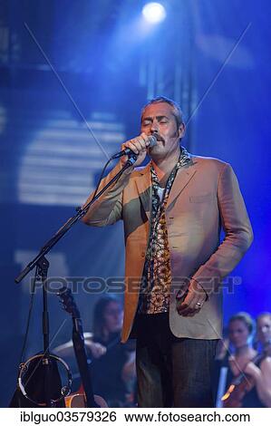 "Stuart A. Staples, singer and frontman of the British band Tindersticks live at the Blue Balls Festival, KKL venue, Luzern, Canton of Lucerne, Switzerland, Europe" View Large Photo Image Stock Photograph - "Stuart A. Staples, singer and frontman of the British band Tindersticks live at the Blue Balls Festival, KKL venue, Luzern, Canton of Lucerne, Switzerland, Europe". Fotosearch