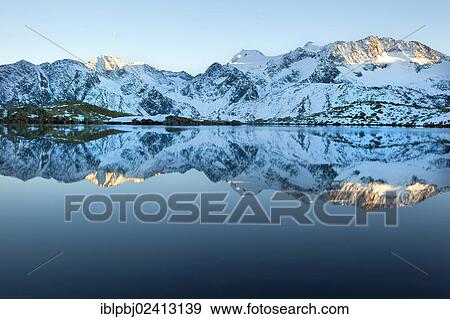 Stubai Glacier reflected in the water, Tyrol, Austria, Europe View Large Photo Image Stock Photo - Stubai Glacier reflected in the water, Tyrol, Austria, Europe. Fotosearch