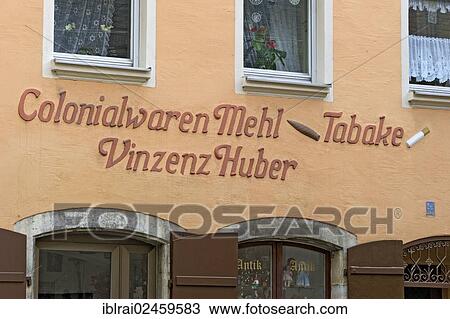 "Stucco embossed lettering of a historic store, historic town centre of Regensburg, Upper Palatinate, Bavaria, Germany, Europe" View Large Photo Image Stock Image - "Stucco embossed lettering of a historic store, historic town centre of Regensburg, Upper Palatinate, Bavaria, Germany, Europe". Fotosearch