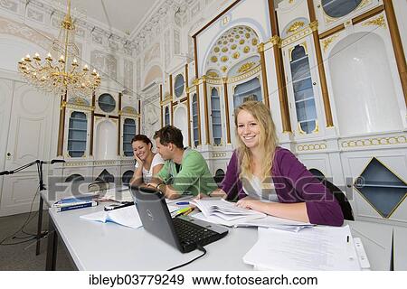 "Students studying in the departmental library of the University of Hohenheim in Schloss Hohenheim Palace, Stuttgart, Baden-Wurttemberg, Germany, Europe" View Large Photo Image Stock Photo - "Students studying in the departmental library of the University of Hohenheim in Schloss Hohenheim Palace, Stuttgart, Baden-Wurttemberg, Germany, Europe". Fotosearch