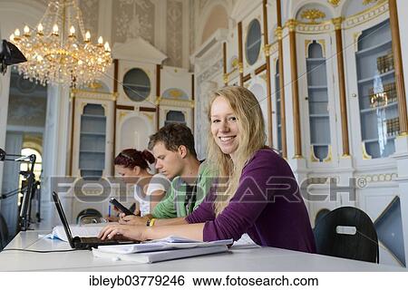 "Students studying in the departmental library of the University of Hohenheim in Schloss Hohenheim Palace, Stuttgart, Baden-Wurttemberg, Germany, Europe" View Large Photo Image Stock Photograph - "Students studying in the departmental library of the University of Hohenheim in Schloss Hohenheim Palace, Stuttgart, Baden-Wurttemberg, Germany, Europe". Fotosearch