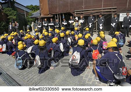 "Students wearing school uniforms are being split into groups by a teacher for the taxi ride, in front of the Kiyomizu-dera Temple, each taxi driver is driving a group of students through Kyoto, Japan, East Asia, Asia" View Large Photo Image Stock Image - "Students wearing school uniforms are being split into groups by a teacher for the taxi ride, in front of the Kiyomizu-dera Temple, each taxi driver is driving a group of students through Kyoto, Japan, East Asia, Asia". Fotosearch