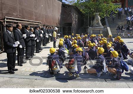 "Students wearing school uniforms are being split into groups by a teacher for the taxi ride, in front of the Kiyomizu-dera Temple, each taxi driver is driving a group of students through Kyoto, Japan, East Asia, Asia" View Large Photo Image Stock Photo - "Students wearing school uniforms are being split into groups by a teacher for the taxi ride, in front of the Kiyomizu-dera Temple, each taxi driver is driving a group of students through Kyoto, Japan, East Asia, Asia". Fotosearch