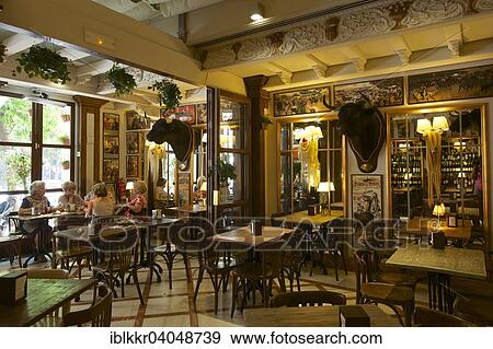 "Stuffed bull heads in the Cerveceria Catedral, Barrio de Santa Cruz, Seville, Andalucia, Spain, Europe" View Large Photo Image Stock Photo - "Stuffed bull heads in the Cerveceria Catedral, Barrio de Santa Cruz, Seville, Andalucia, Spain, Europe". Fotosearch