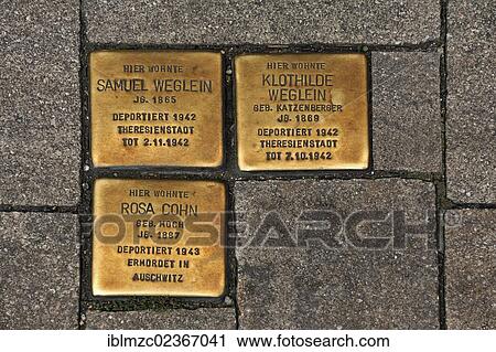 Stock Image - "Stumbling blocks, memorial stones for deported and murdered Jews in the Third Reich, 1942-1943, main road in Erlangen, Middle Franconia, Bavaria, Germany, Europe". Fotosearch