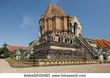 Stock Image - "Stupa with elephants, Naga staircase, ruins of the temple of Wat Chedi Luang, Chiang Mai, Northern Thailand, Thailand, Asia". Fotosearch
