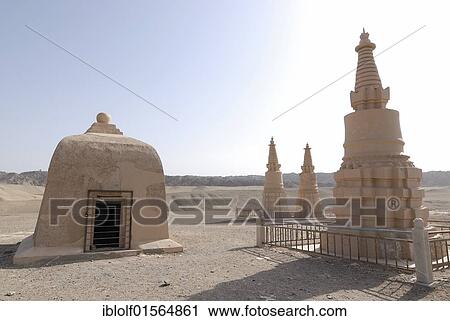 "Stupas in front of the Gobi Desert near the Mogao Grottoes at Dunhuang, Silk Road, Gansu, China, Asia" View Large Photo Image Stock Image - "Stupas in front of the Gobi Desert near the Mogao Grottoes at Dunhuang, Silk Road, Gansu, China, Asia". Fotosearch