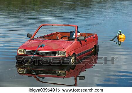 "Subaru car turned into a boat, floating on a lake, Norway, Europe" View Large Photo Image Stock Photography - "Subaru car turned into a boat, floating on a lake, Norway, Europe". Fotosearch