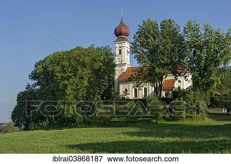 Stock Photo - "Subsidiary Church of St. Peter and Paul with onion dome, Kirchberg, Upper Bavaria, Bavaria, Germany, Europe". Fotosearch