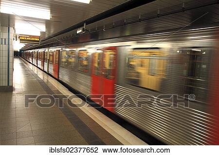 Stock Image - "Subway station with arriving train, Hamburg, Germany, Europe". Fotosearch