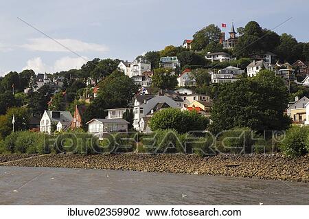 "Suellberg hill with restaurant and observation tower at the top, Hamburg's Blankenese quarter on the Elbe river, Treppenviertel, stairs quarter, Altona district, suburb on the Elbe river, Hamburg, Germany, Europe, PublicGround, Europe" View Large Photo Image Stock Image - "Suellberg hill with restaurant and observation tower at the top, Hamburg's Blankenese quarter on the Elbe river, Treppenviertel, stairs quarter, Altona district, suburb on the Elbe river, Hamburg, Germany, Europe, PublicGround, Europe". Fotosearch