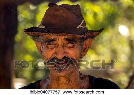 "Sugar cane farmer wearing a hat, portrait, Valle de los Ingenios, Trinidad, Sancti Spiritus Province, Cuba, North America" View Large Photo Image Stock Photo - "Sugar cane farmer wearing a hat, portrait, Valle de los Ingenios, Trinidad, Sancti Spiritus Province, Cuba, North America". Fotosearch