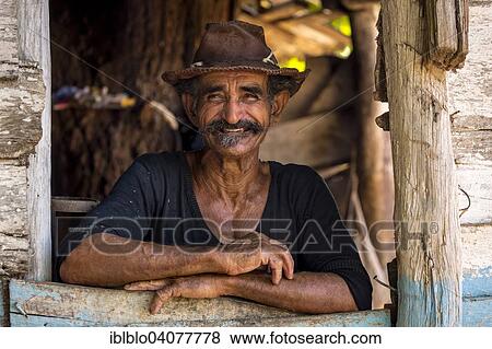 "Sugar cane farmer wearing a hat, portrait, Valle de los Ingenios, Trinidad, Sancti Spiritus Province, Cuba, North America" View Large Photo Image Stock Photo - "Sugar cane farmer wearing a hat, portrait, Valle de los Ingenios, Trinidad, Sancti Spiritus Province, Cuba, North America". Fotosearch