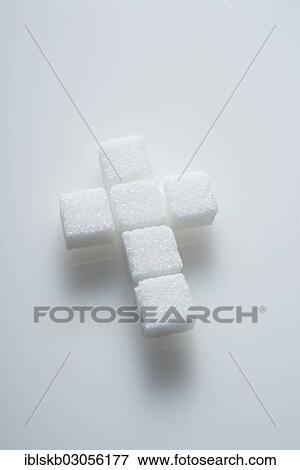 Sugar cubes in the shape of a cross View Large Photo Image Stock Photo - Sugar cubes in the shape of a cross. Fotosearch