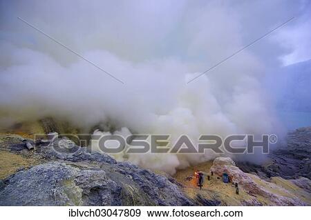 "Sulfur miners mining sulfur at Ijen Volcano, with the crater lake of Ijen at the rear, Kawah ljen, Eastern Java, Java, Indonesia, Asia" View Large Photo Image Stock Photo - "Sulfur miners mining sulfur at Ijen Volcano, with the crater lake of Ijen at the rear, Kawah ljen, Eastern Java, Java, Indonesia, Asia". Fotosearch